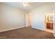 Bright bedroom with an ensuite bathroom at 21391 E Orchard Ln, Queen Creek, AZ 85142