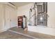 Garage with water heater and HVAC system at 21391 E Orchard Ln, Queen Creek, AZ 85142