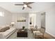 Bright living room featuring hardwood floors and a neutral color palette at 3510 N 106Th Ln, Avondale, AZ 85392