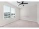Spacious bedroom featuring a window with blinds at 38124 W Santa Barbara Ave, Maricopa, AZ 85138