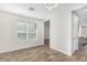 Bright dining room with tile floors and a chandelier at 38124 W Santa Barbara Ave, Maricopa, AZ 85138