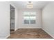 Bright dining room with tile floors and a chandelier at 38124 W Santa Barbara Ave, Maricopa, AZ 85138