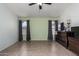 Primary bedroom with dark wood furniture and tiled floors at 3949 E Monona Dr, Phoenix, AZ 85050