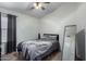 Bedroom with a queen-size bed and a ceiling fan at 3949 E Monona Dr, Phoenix, AZ 85050