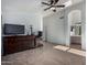 Spacious bedroom with large dresser and ensuite bathroom at 3949 E Monona Dr, Phoenix, AZ 85050