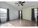 Bright bedroom with tiled floors and large windows at 3949 E Monona Dr, Phoenix, AZ 85050