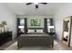 Bright bedroom featuring a comfortable bed and large windows at 3949 E Monona Dr, Phoenix, AZ 85050