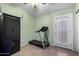 Home office with treadmill and built-in storage at 3949 E Monona Dr, Phoenix, AZ 85050