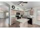 Kitchen with island, stainless steel appliances, and wood cabinets at 3949 E Monona Dr, Phoenix, AZ 85050
