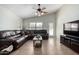 Living room with sectional sofa, coffee table, and flat-screen TV at 3949 E Monona Dr, Phoenix, AZ 85050