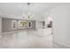 Bright dining area with chandelier and tile floors at 575 Leisure World --, Mesa, AZ 85206