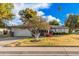 Single story home with landscaped yard and two car garage at 575 Leisure World --, Mesa, AZ 85206