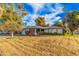 Single story home with landscaped yard and two car garage at 575 Leisure World --, Mesa, AZ 85206