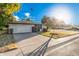 Single story home with landscaped yard and two car garage at 575 Leisure World --, Mesa, AZ 85206