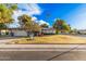 Single story home with landscaped yard and two car garage at 575 Leisure World --, Mesa, AZ 85206