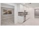 Modern kitchen features white cabinets, granite countertops, and stainless steel appliances at 575 Leisure World --, Mesa, AZ 85206