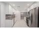 Updated kitchen boasts stainless steel appliances and granite countertops at 575 Leisure World --, Mesa, AZ 85206