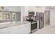 Modern kitchen with stainless steel appliances and granite counters at 575 Leisure World --, Mesa, AZ 85206
