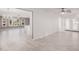 Open living room with tile floors and views to kitchen and backyard at 575 Leisure World --, Mesa, AZ 85206