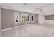 Living room featuring tile floors, a ceiling fan, and window at 575 Leisure World --, Mesa, AZ 85206