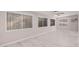 Sunroom with light flooring, ceiling fan and multiple windows at 575 Leisure World --, Mesa, AZ 85206