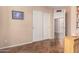 Bedroom with double door closet and tile flooring at 6045 E Wildcat Dr, Cave Creek, AZ 85331