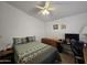 Bright bedroom with a double bed, desk, and ceiling fan at 650 N Hawes Rd # 4634, Mesa, AZ 85207