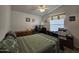 Second bedroom with a desk setup and ample closet space at 650 N Hawes Rd # 4634, Mesa, AZ 85207