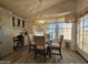 Charming dining area with a glass table and built-in desk at 650 N Hawes Rd # 4634, Mesa, AZ 85207