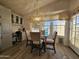Cozy dining area with glass-top table and seating for four at 650 N Hawes Rd # 4634, Mesa, AZ 85207