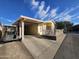 Home exterior showcasing carport and landscaping at 650 N Hawes Rd # 4634, Mesa, AZ 85207
