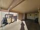 Covered carport with golf cart and storage area at 650 N Hawes Rd # 4634, Mesa, AZ 85207