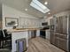Modern kitchen with stainless steel appliances and ample cabinetry at 650 N Hawes Rd # 4634, Mesa, AZ 85207