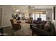 Spacious living room with comfortable seating and large windows at 650 N Hawes Rd # 4634, Mesa, AZ 85207