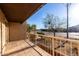 Private balcony overlooking a tree-lined street at 7402 E Carefree Dr # 319, Carefree, AZ 85377