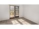 Bright bedroom with plush carpeting and sliding glass doors leading to a balcony at 7402 E Carefree Dr # 319, Carefree, AZ 85377