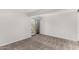 Bedroom with neutral walls, plush carpet, and private balcony access at 7402 E Carefree Dr # 319, Carefree, AZ 85377