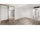 Bright bedroom with mirrored closet doors and neutral carpeting at 7402 E Carefree Dr # 319, Carefree, AZ 85377