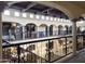Two story interior with open walkways and shops below at 7402 E Carefree Dr # 319, Carefree, AZ 85377