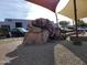 Unique Gila monster statue in front of commercial building at 7402 E Carefree Dr # 319, Carefree, AZ 85377
