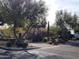 Landscaped area with trees, cacti, and walkway at 7402 E Carefree Dr # 319, Carefree, AZ 85377