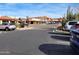Parking lot with businesses surrounding at 7402 E Carefree Dr # 319, Carefree, AZ 85377