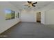 Spacious bedroom with ceiling fan and ample natural light at 881 E Lynx Way, Chandler, AZ 85249