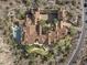Bird's-eye view of a sprawling estate with a courtyard and pool at 11068 E Canyon Cross Way, Scottsdale, AZ 85255