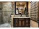 Bathroom with dark wood vanity and a glass shower at 11068 E Canyon Cross Way, Scottsdale, AZ 85255
