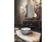 Powder room with ornate sink and dark tile accents at 11068 E Canyon Cross Way, Scottsdale, AZ 85255