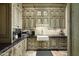 Well-equipped butler's pantry with farmhouse sink and ample storage at 11068 E Canyon Cross Way, Scottsdale, AZ 85255