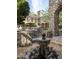 Ornate fountain in a stone courtyard setting at 11068 E Canyon Cross Way, Scottsdale, AZ 85255