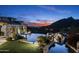 Luxury pool and spa with mountain views at sunset at 11068 E Canyon Cross Way, Scottsdale, AZ 85255