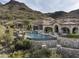Luxury pool and spa overlooking a mountain vista at 11068 E Canyon Cross Way, Scottsdale, AZ 85255
